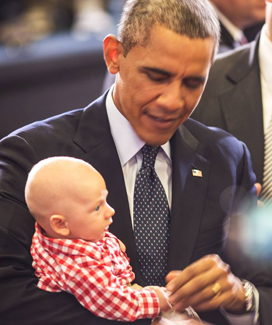 President Obama Cradles Elliott Beers -- photo by Rich Ankeney