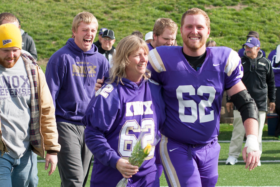 Brian Paul with mother Cindy and two brothers at Senior Day 2014