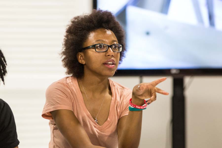 Knox College student rehearsing The Island of Slaves by Pierre Marivaux