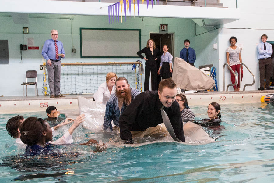 Knox College students in Organizational Psychology participate in team building games in the swimming pool.