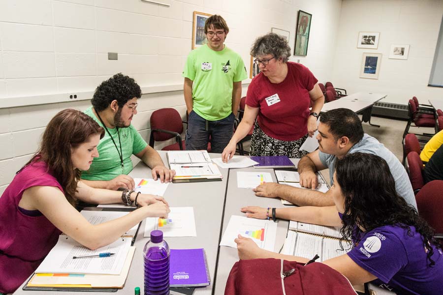 Knox College SPARK students working with mathematics professor Mary Armon.