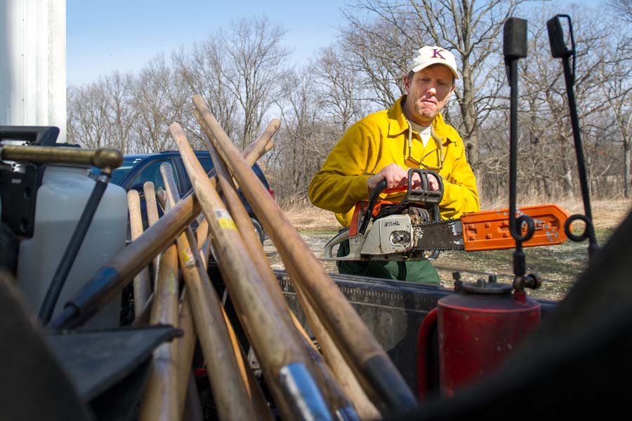 Knox College biology professor Stuart Allison prepares for the 2016 Green Oaks Prairie Burn.