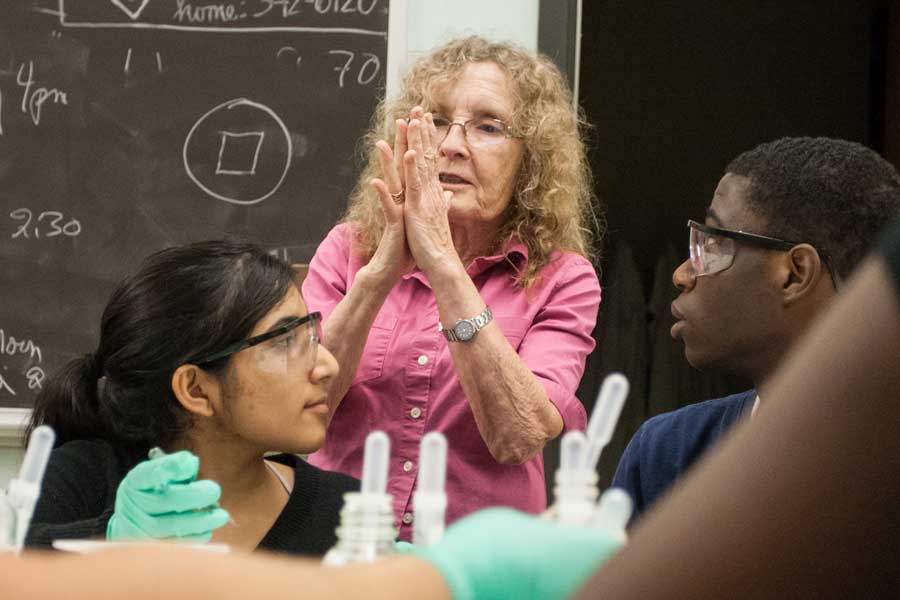 Knox College biology professor Linda Dybas with students in histology lab.