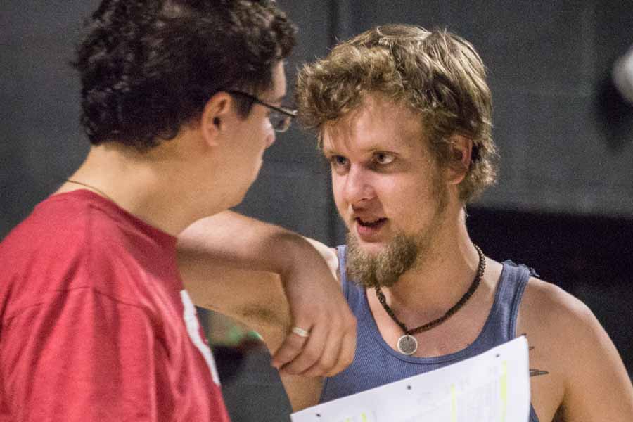 Two Knox College students in a theatre rehearsal.
