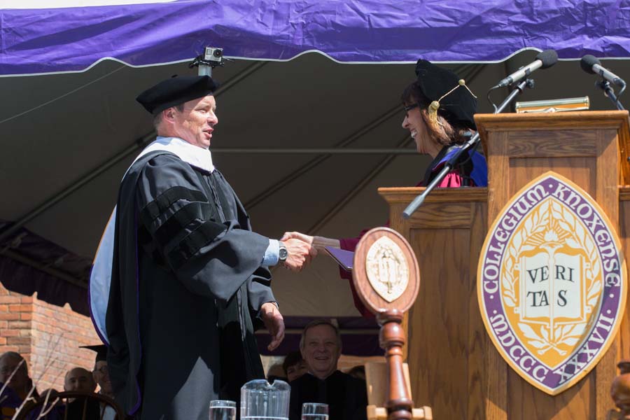 Chad Pregracke receives honorary degree from Knox College President Teresa Amott.