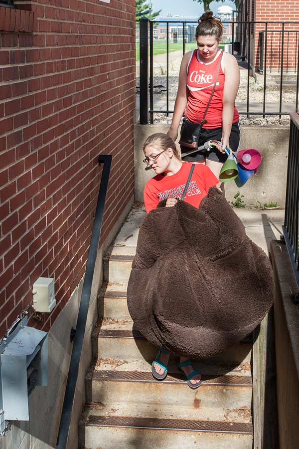 Knox College students move items from residence halls to the campus Share Shop.