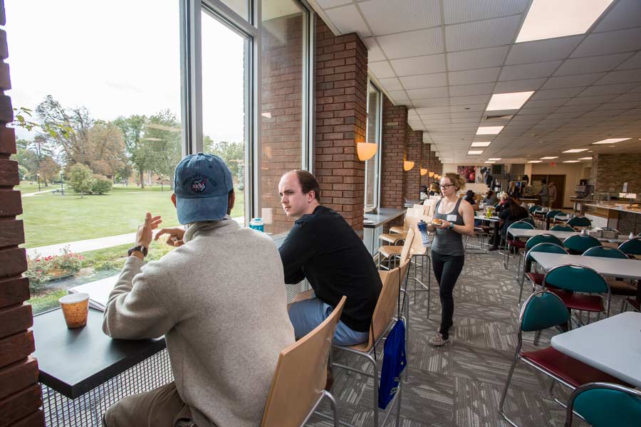 The renovated Hard Knox Cafe is more open, modern, and offers  seating along windows facing the scenic campus.