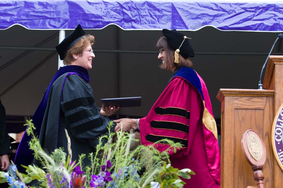Ambassador Fay Hartog-Levin is awarded an honorary degree by Teresa Amott, president of Knox College.
