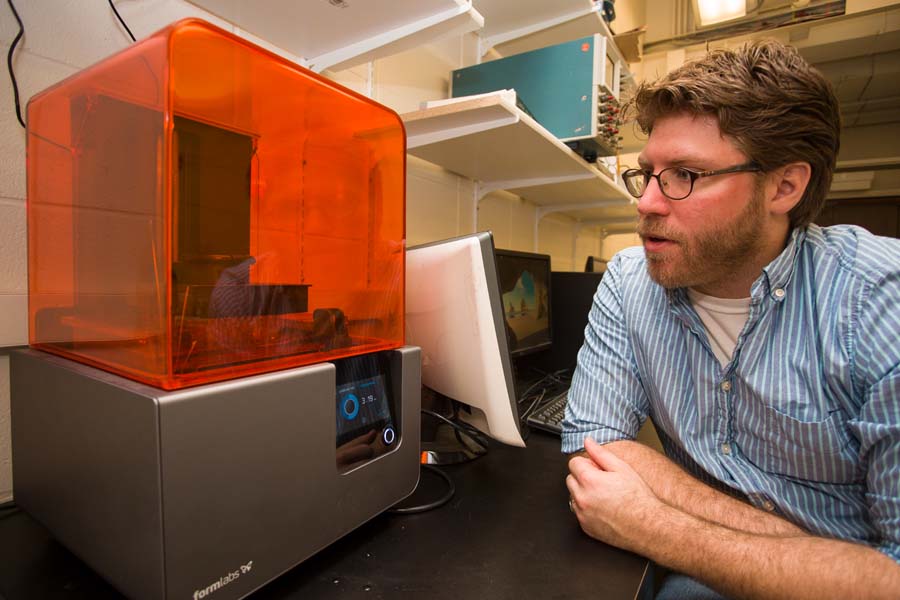 Biology professor Nicholas Gidmark and new 3D printer