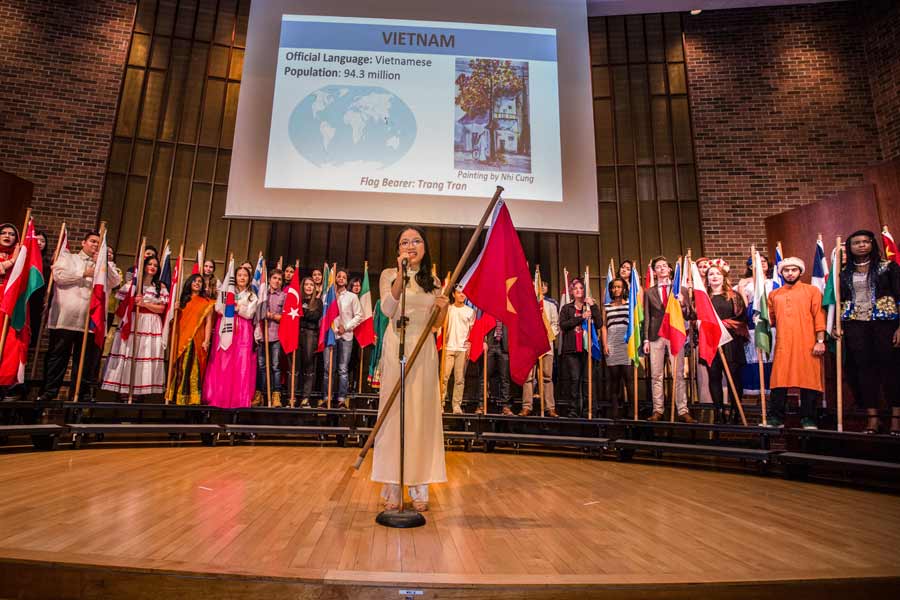 Students show their national colors through the Flag Parade at International Fair 2017.