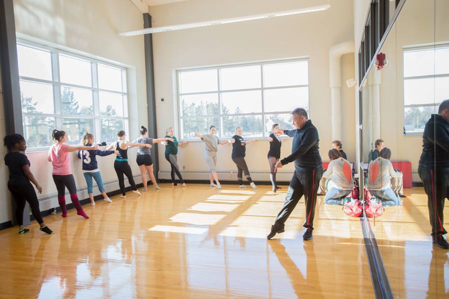 Artist in Residence Jeremy Lindberg instructs a ballet class.