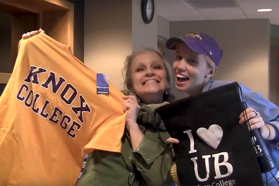 A mother and daughter celebrate with Knox gear at the PB&J Cookoff at Family & Friends Weekend.