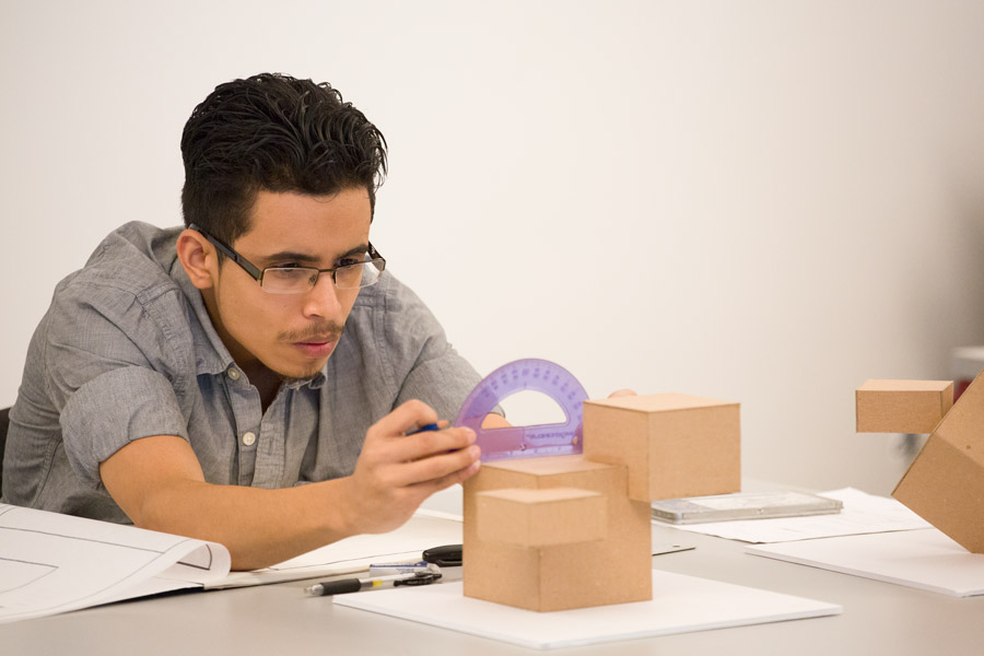 Student works on architectural models