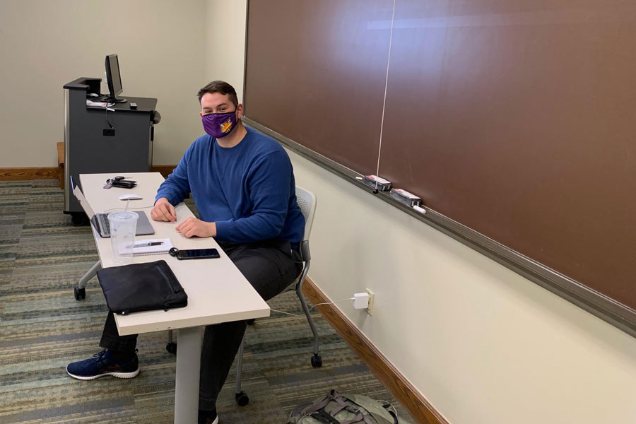 Student teacher Connor McClelland set up his remote high school classroom in an empty Knox classroom