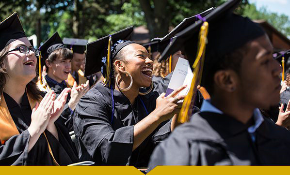 Graduates laughing during Commencement 2016
