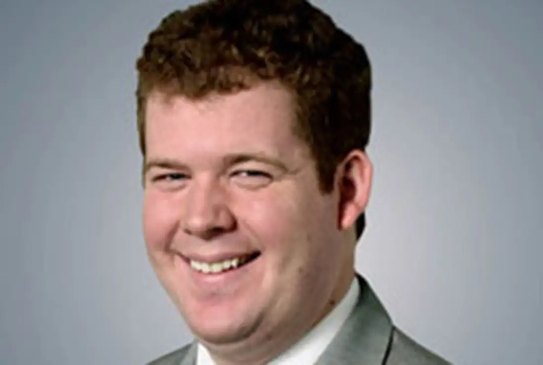 A headshot of Zach Stephenson looking at the camera and smiling.