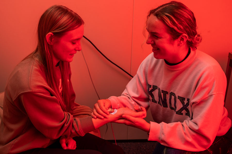 Katie Anderson ’22 placing sensors on student