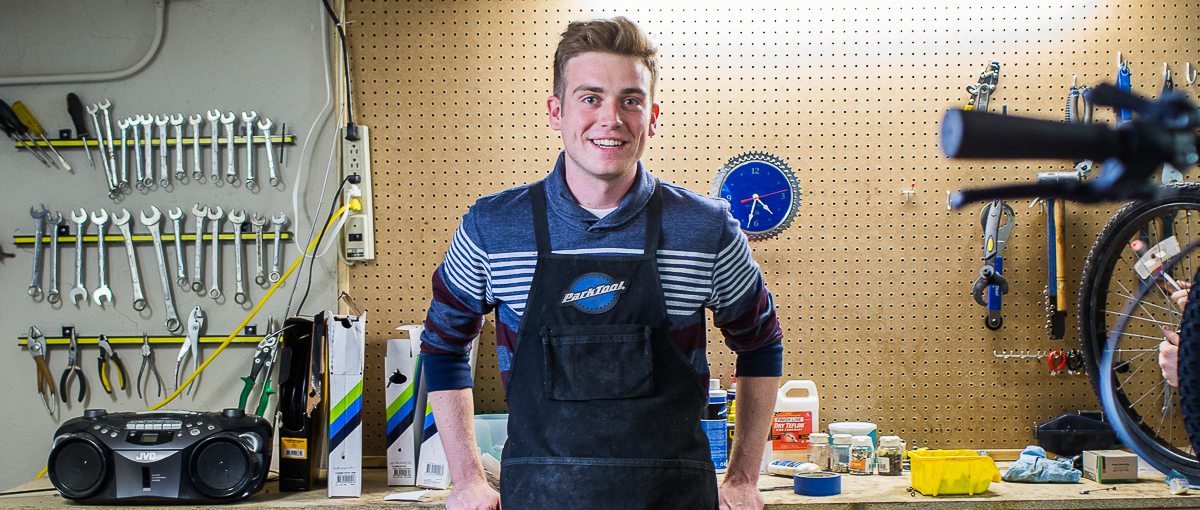 A student in the Knox Bike Shop. 