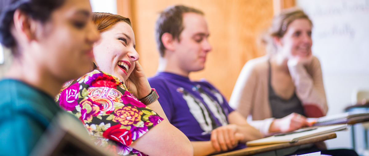 Students react to a comment from the professor in George Davis Hall. 