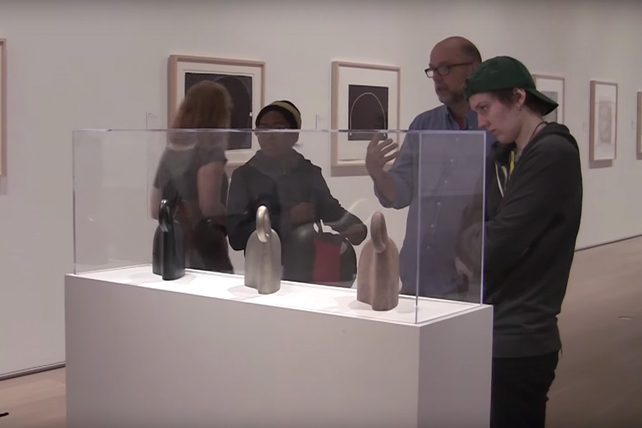 Students view art at a museum in Chicago.