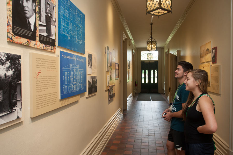 Knox College students view new history exhibits in Old Main on the Knox campus.